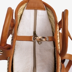 Raffia and leather basket designed for La Sultana